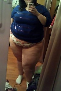 sensual girl sensually licking her thick bra-stuffers