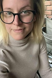 obese chick seductively posing in lingerie