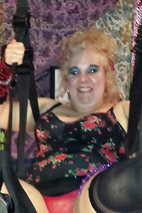 curvaceous girl performing a obscene dance, fascinating the viewer